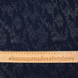 Muselina estampada pepitas de oro con fondo marino