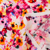 Viscose imprimée danse de fleurs jaune et rose fond blanc