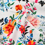Viscose imprimée bataille de fleurs fond blanc