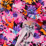 Viscose imprimée nuage de fleurs fond rose