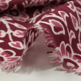 Coton batik imprimé Agra fond lie de vin