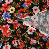 Viscose imprimée lien floral rouge fond noir