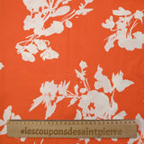Viscose imprimée silhouette florale fond orange
