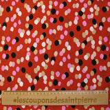 Viscose imprimée confettis noir, rose et beige fond rouge