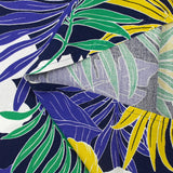 Viscose imprimée végétation tropicale jaune et vert fond marine