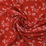 Viscose imprimée buisson floral fond rouge