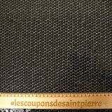 Sequins noirs sur tulle