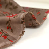 Coton imprimé fleur rouge fond taupe