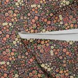 Water-repellent waterproof fabric with orange floral garden print