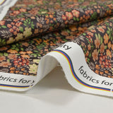 Water-repellent waterproof fabric with orange floral garden print
