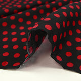 Viscose imprimée à pois 8mm rouge fond noir