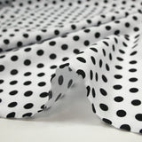 Viscose imprimée à pois 8mm noir fond blanc