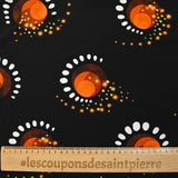 Maille de viscose satinée imprimée éclipse orange fond noir