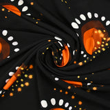 Maille de viscose satinée imprimée éclipse orange fond noir