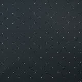 Cotton printed with mini polka dots on a midnight blue background