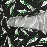 Maille de viscose satinée imprimée brin de muguet fond noir