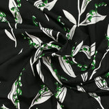 Maille de viscose satinée imprimée brin de muguet fond noir