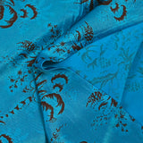 Maille de viscose satinée imprimée Versailles fond bleu turquoise