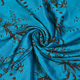 Maille de viscose satinée imprimée Versailles fond bleu turquoise