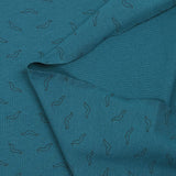Jersey de coton imprimé moustache fond bleu pétrole