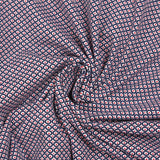 Cotton jersey printed red polka dots with navy circle and white background