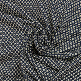 Cotton jersey printed with dotted diamonds, navy background
