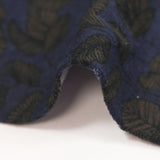 Cotton jersey with leaf liana print on navy background