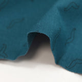 Jersey de coton imprimé moustache fond bleu pétrole
