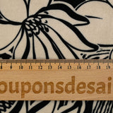 Short velvet jersey printed with ivory flowers and black background