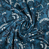 Indian cotton printed white flower and petroleum blue denim background