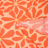 Double gaze imprimée flower power fond mandarine