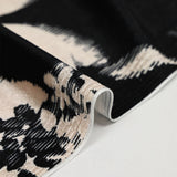 Jersey de velours ras imprimé feuille graphique noire fond ivoire