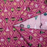 Cotton poplin printed with gold diamonds, moons and stars on a purple background