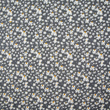 Viscose imprimée fleurs blanches et jaunes fond gris anthracite