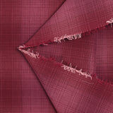 Ottoman de polyester à carreaux framboise