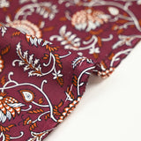 Indian cotton printed Amayra white and rust garnet background