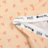 Double gauze printed butterfly on bisque background