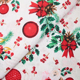 Polycotton printed candles and pine cone with string background