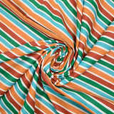 Cotton poplin printed with orange, green and turquoise deckchair stripes