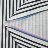 French terry jersey with navy stripe print and off-white background