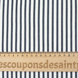 French terry jersey with navy stripe print and off-white background