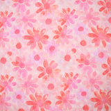 Velo 100% algodón Plumetis coral estampado margaritas fondo rosa