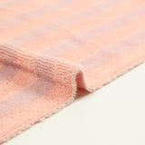 Stripe de tela de esponja de bambú rosa y malva vendida por metro