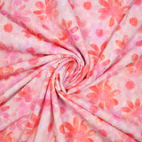 Velo 100% algodón Plumetis coral estampado margaritas fondo rosa