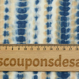 Voile polycoton imprimé ossement bleu et beige fond blanc