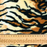 Faux fur tiger blond background