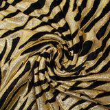 Lamé et velours viscose tigre noir fond doré