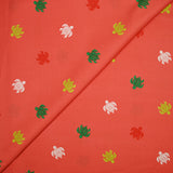 Tortugas de algodón estampado de fondo naranja