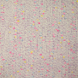 Tweed de laine mélangée confettis rose et bleu fond violet