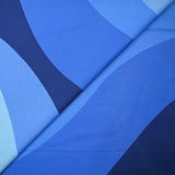 Popeline de coton imprimée vagues camaïeu de bleu